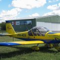 Flugplatz Bad Neustadt - Grasberg am 10.8.2024, die rechte Seite einer Evektor EV-97 Eurostar